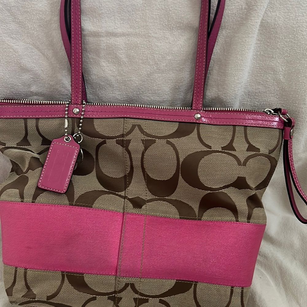 Brown and pink Coach Signature tote bag